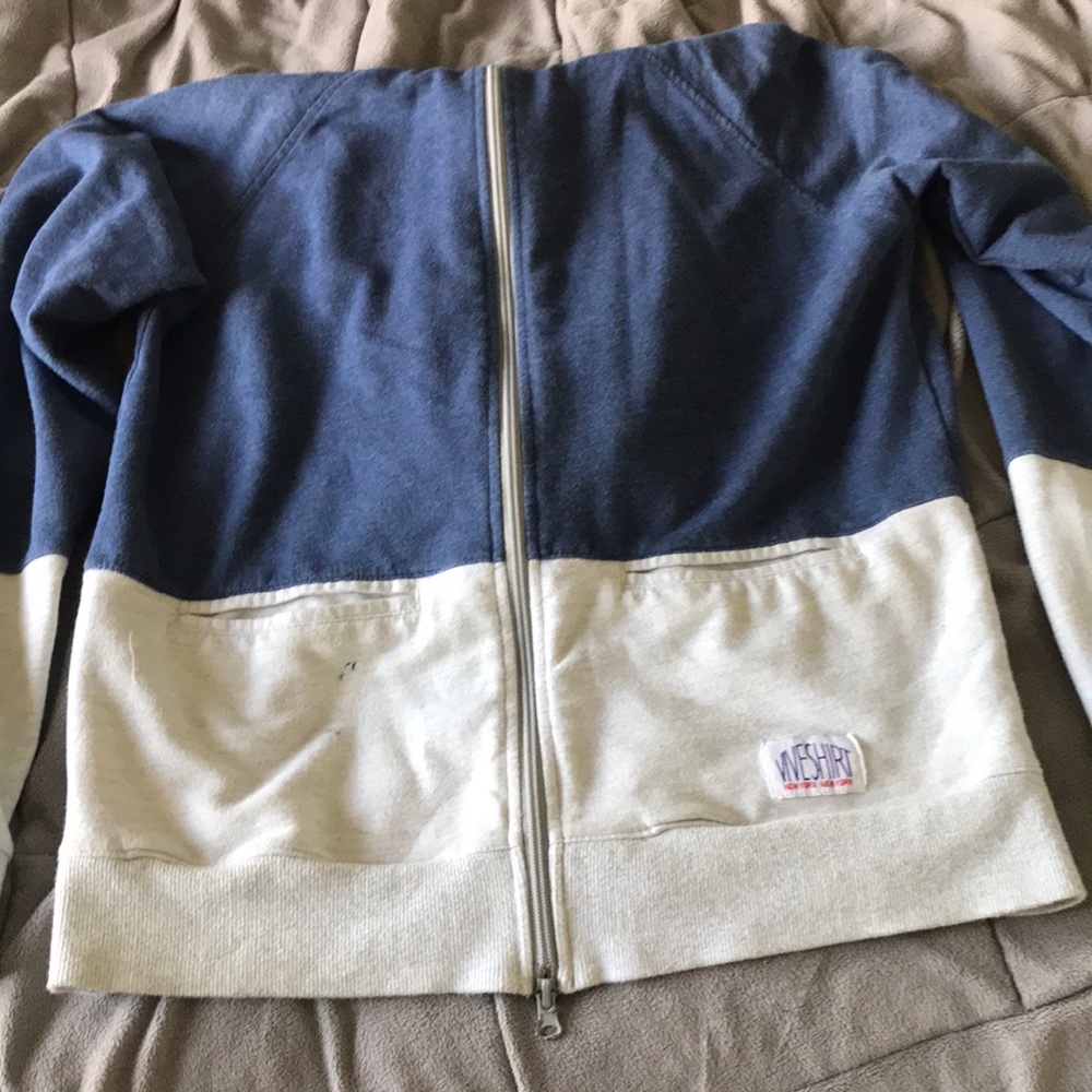 Blue/white zip up jacket.